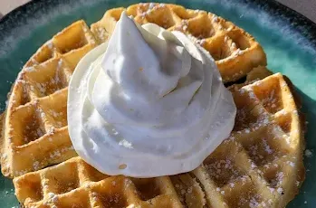 Delicious waffle with whipped cream in Airdrie, AB